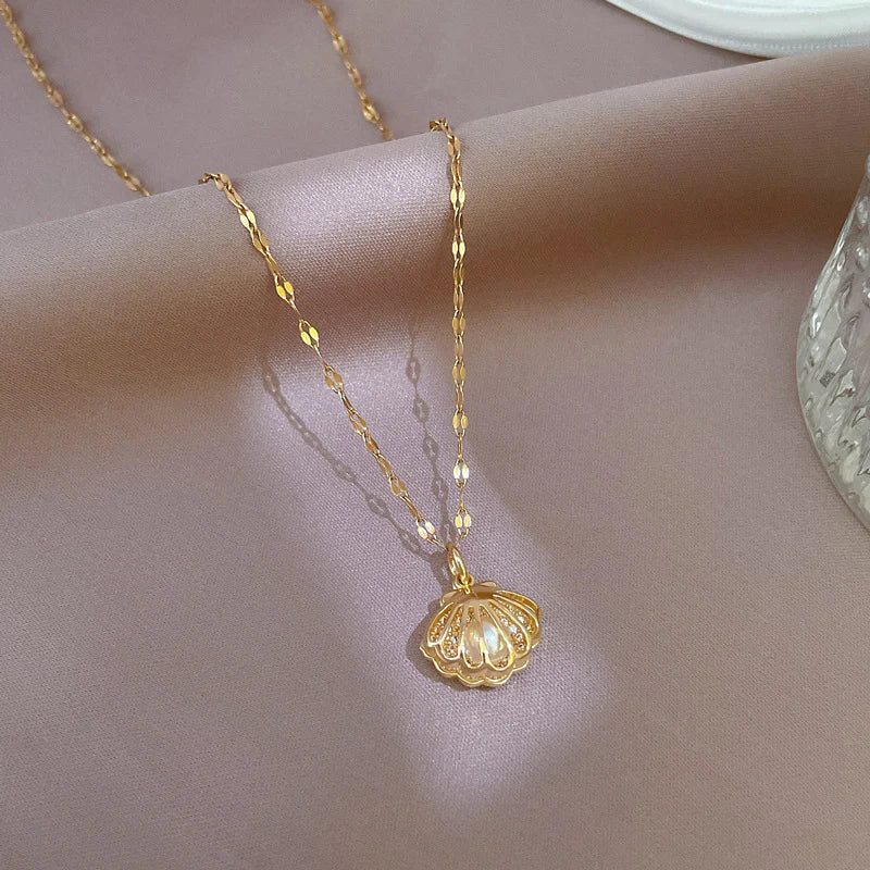 Ocean-inspired shell and pearl necklace