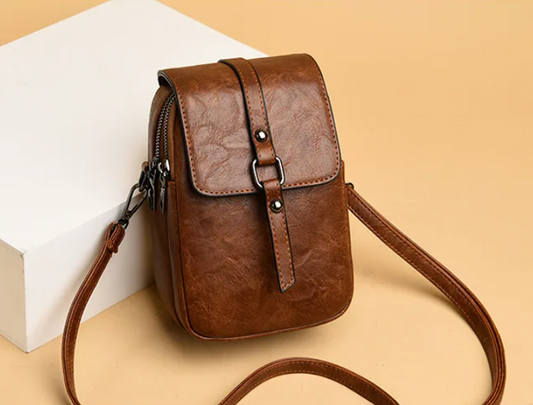Bolso de mujer de moda con cruz y correa ajustable