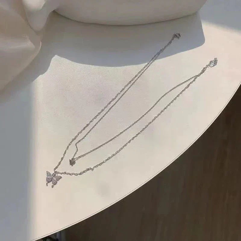 Vivienne | Elegant silver necklace set with a shimmering butterfly pendant