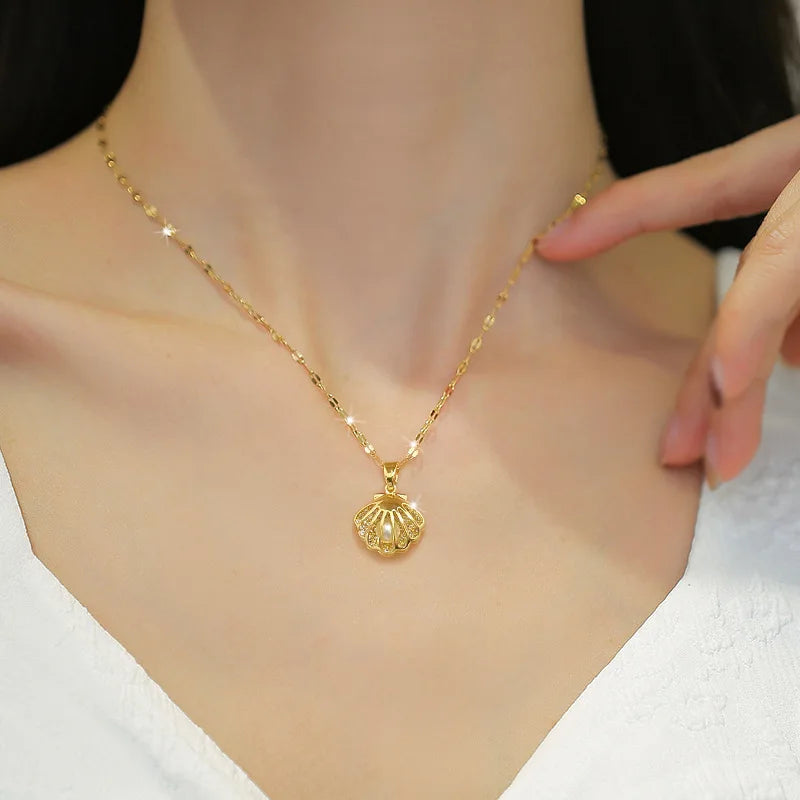 Ocean-inspired shell and pearl necklace