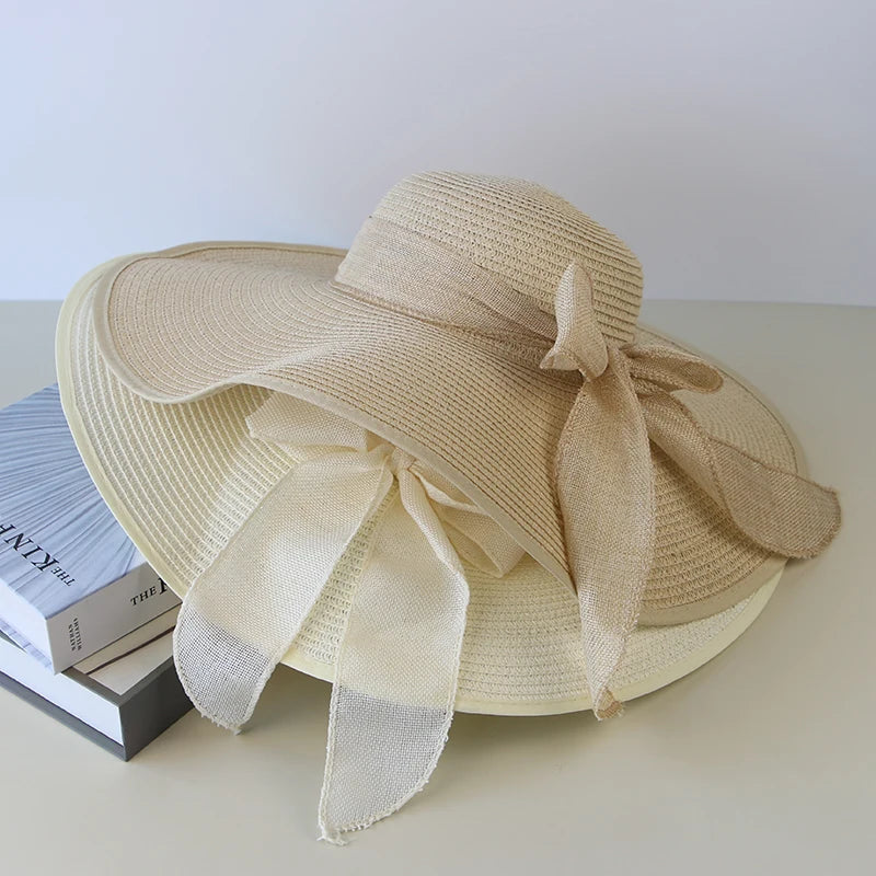 Malira | Women's wide-brimmed straw Panama hat with an elegant bow