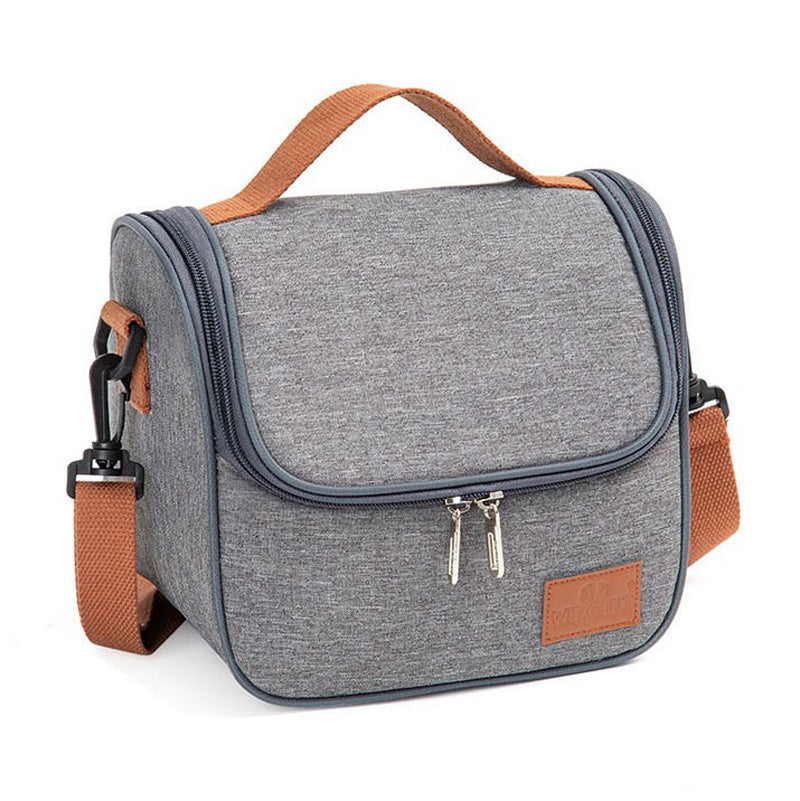 Gray canvas lunch bag with brown handles
