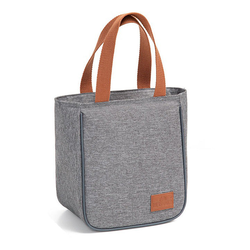 Gray canvas lunch bag with brown handles