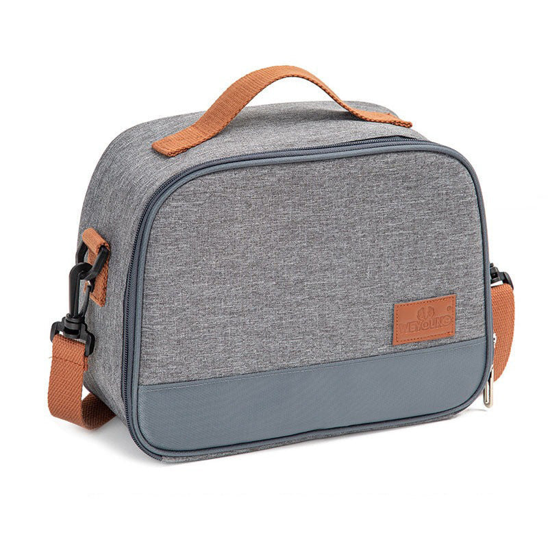 Gray canvas lunch bag with brown handles