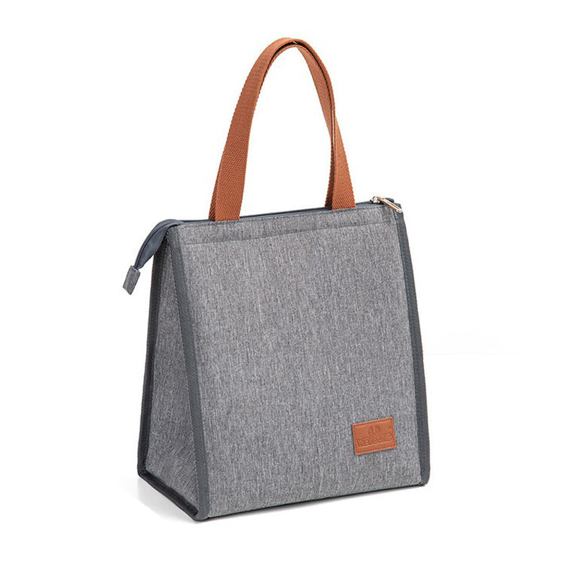Gray canvas lunch bag with brown handles