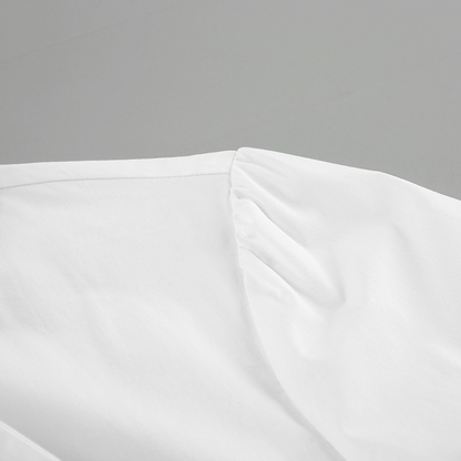 Damska Biała Bluzka | Elegancki Dekolt Z Kokardą I Ponadczasowy Styl