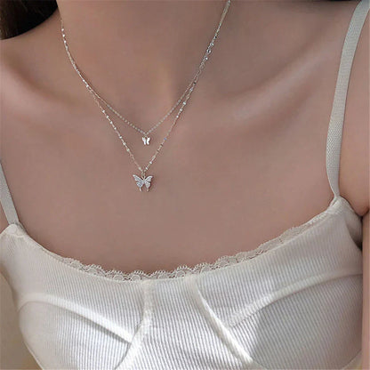 Vivienne | Elegant silver necklace set with a shimmering butterfly pendant