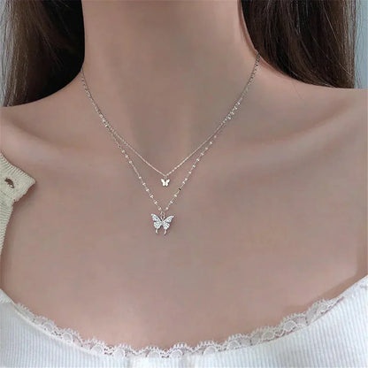 Vivienne | Elegant silver necklace set with a shimmering butterfly pendant